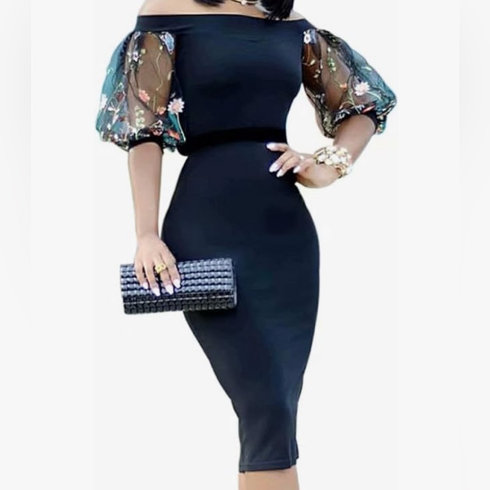 Off the shoulder black dress with lace floral sleeves.